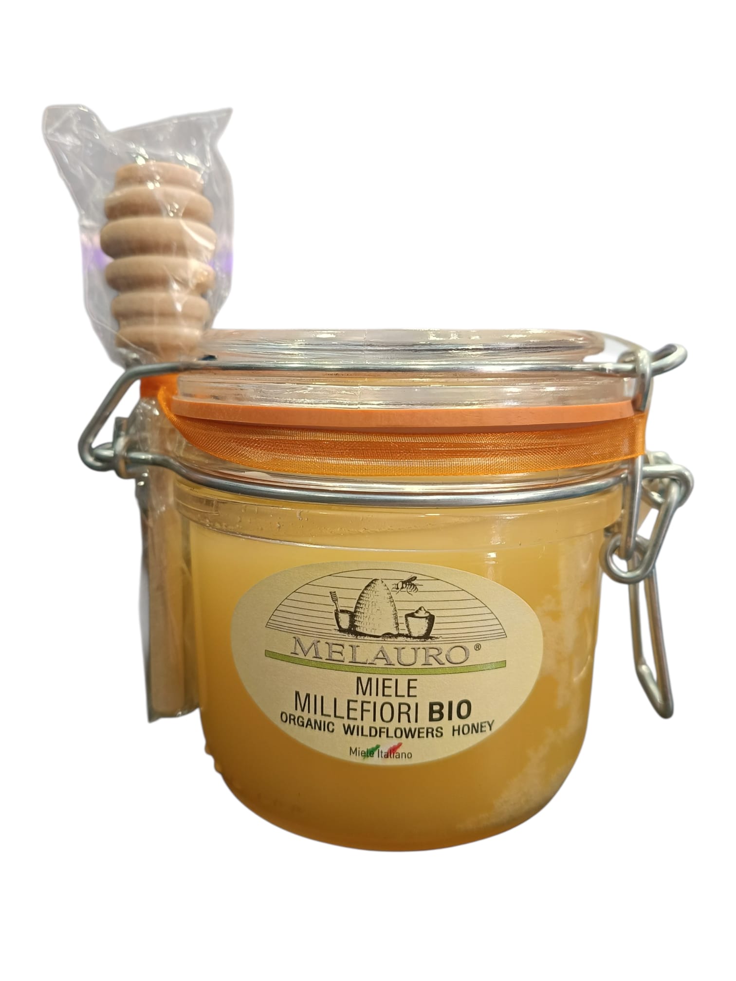 Barattolo di miele con spargimiele in legno